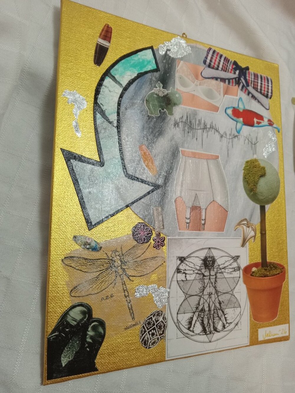 Prints of old magazines on canvas, gold paint, and mixed-media collages